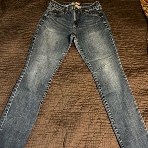 CAbi Women's Skinny Jeans in Faded Blue Wash